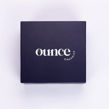 Black box with 'Ounce Organics' logo on a white background